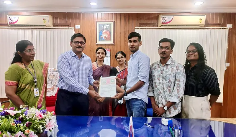 An MoU being handed over between Nexospark and an engineering institution